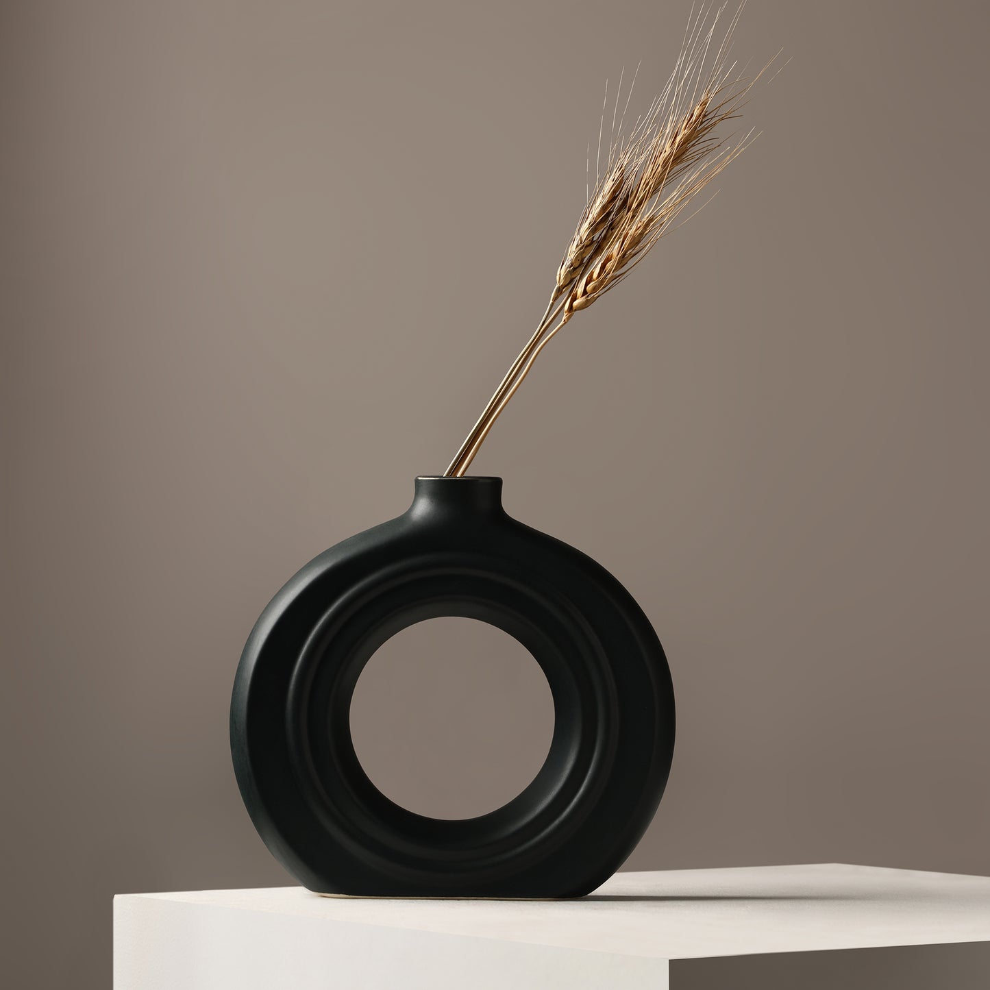 Ceramic Ribbed Donut Vase Set of 8" black & 6″ white – Minimalist Artistry for Modern Spaces