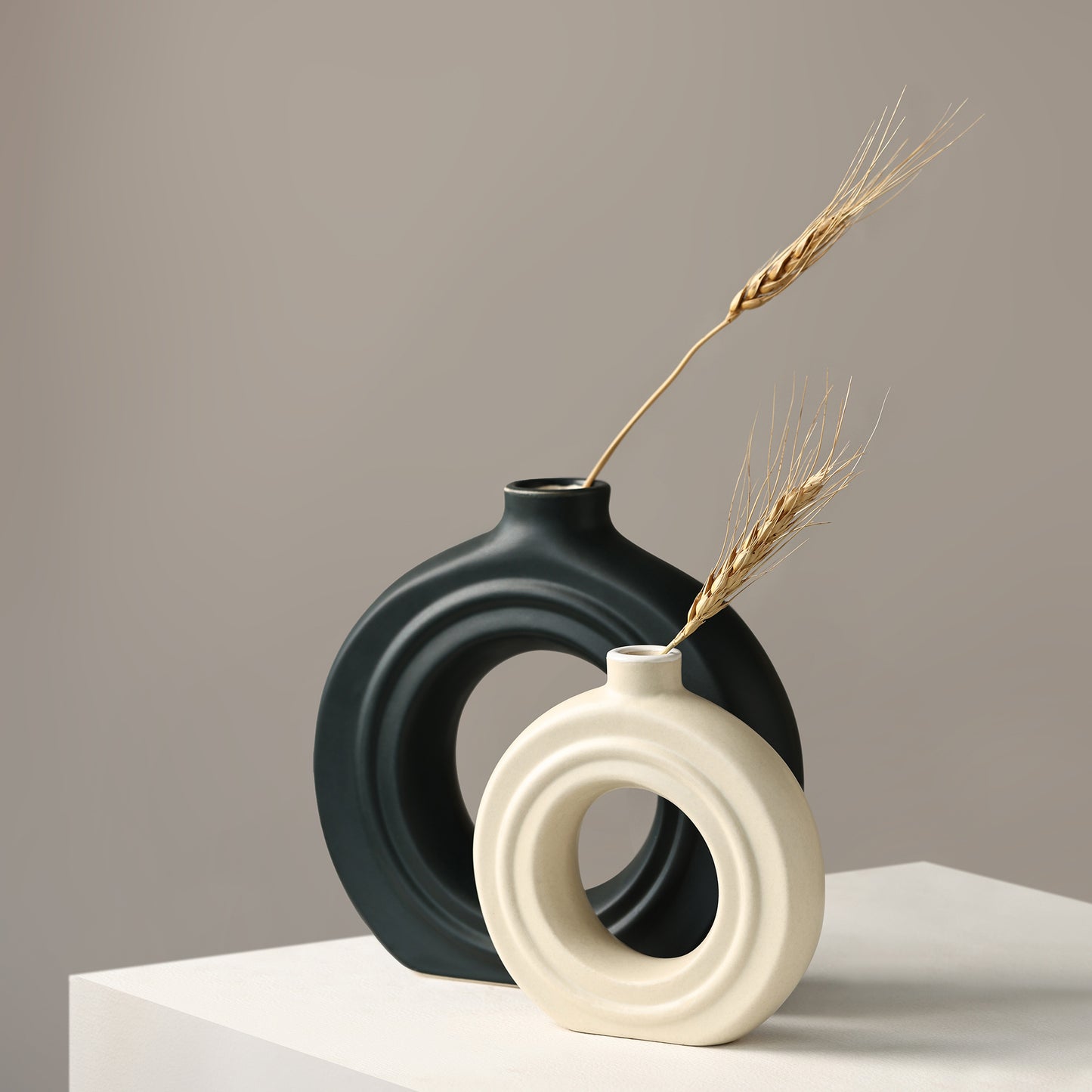 Ceramic Ribbed Donut Vase Set of 8" black & 6″ white – Minimalist Artistry for Modern Spaces