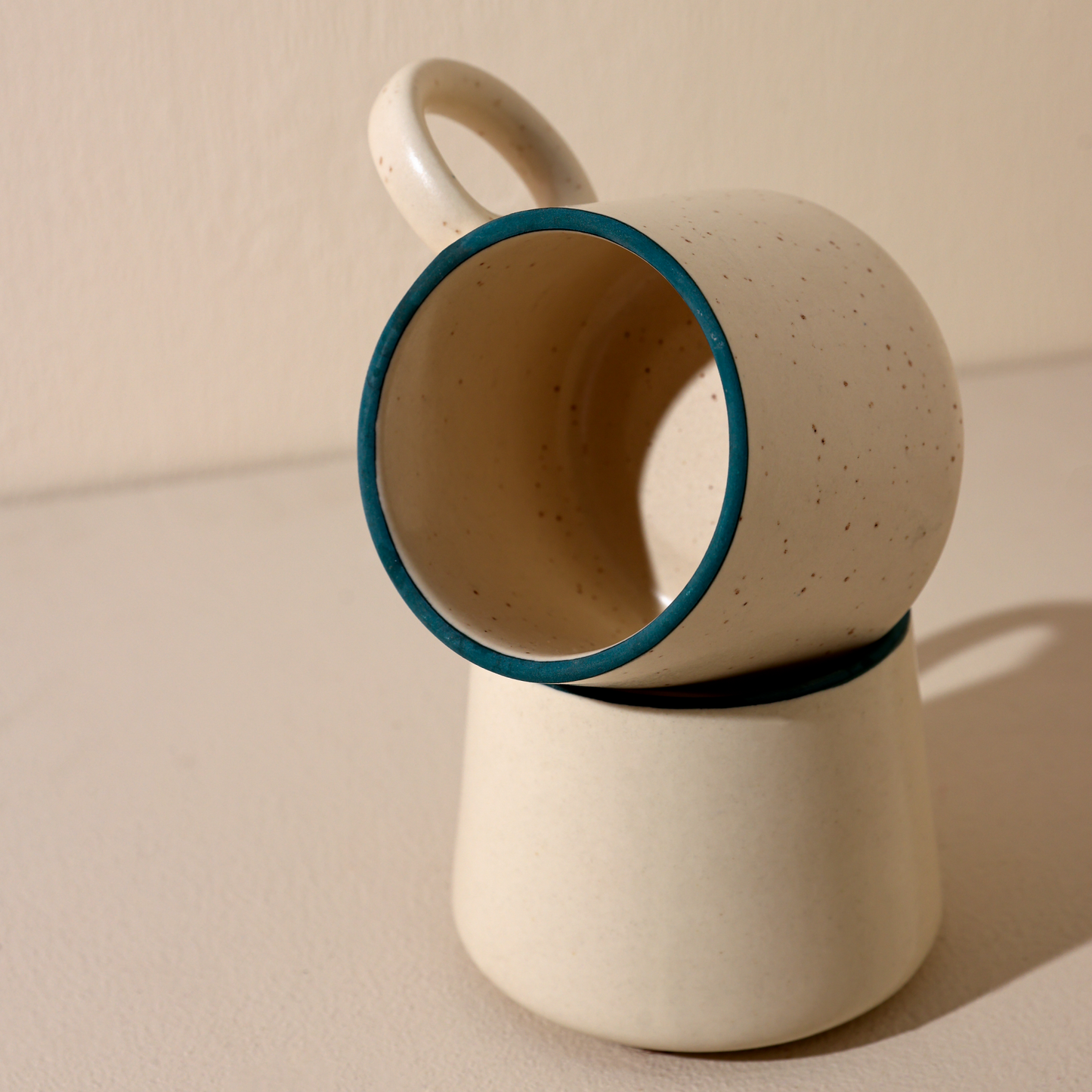Handcrafted Ceramic Cup – Iceberg White with Blue Rim