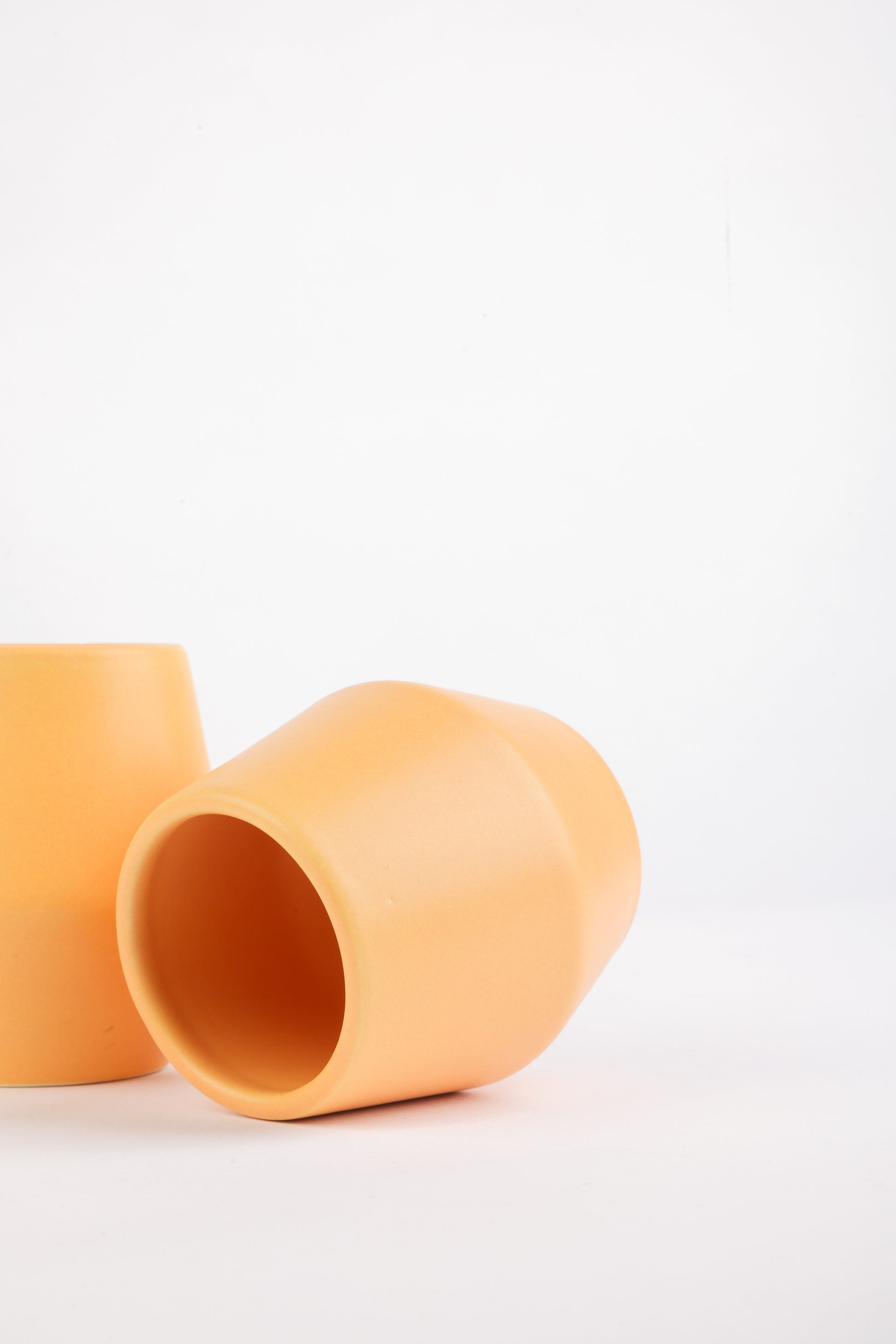 Ochre ceramic cup, detail shot